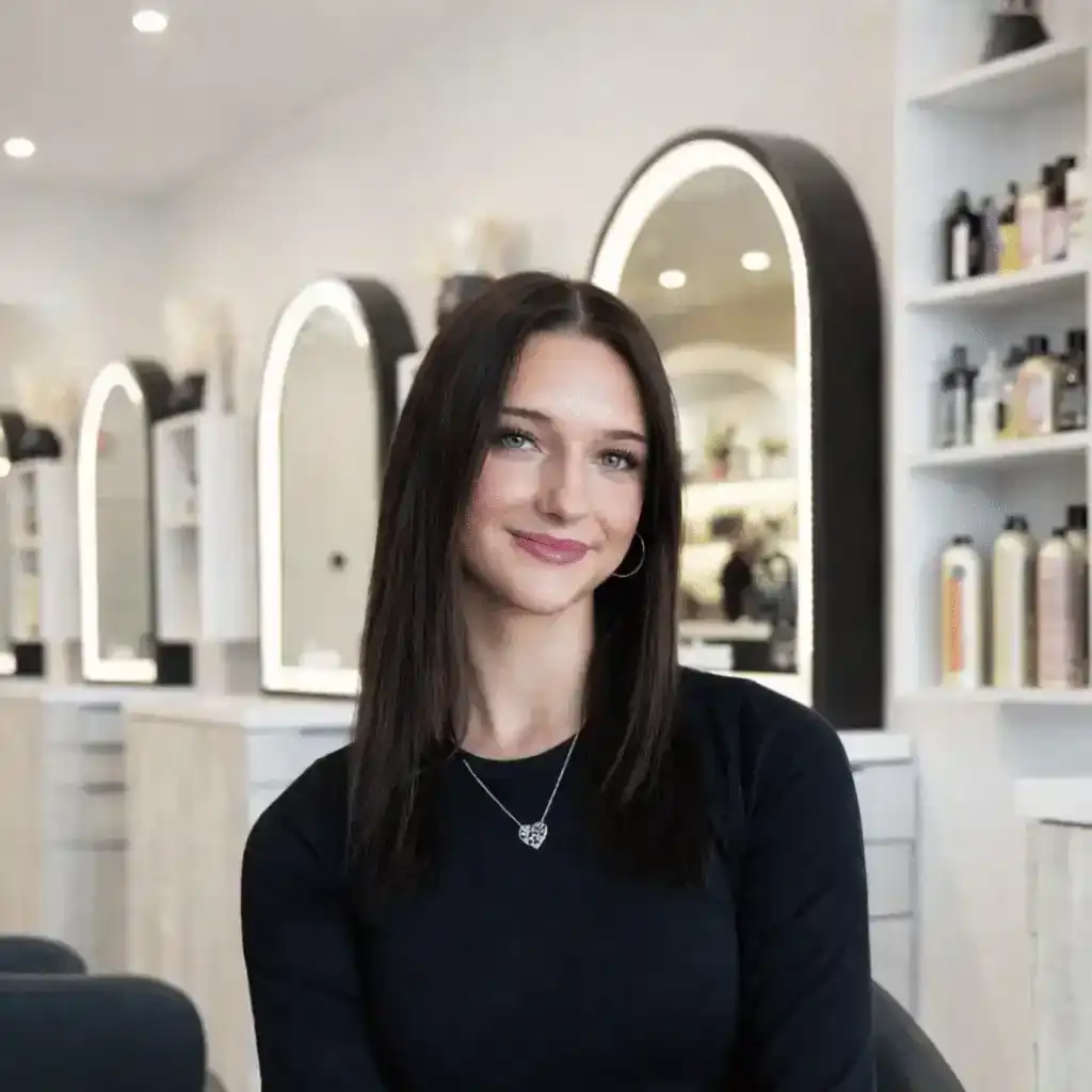 Portrait of Olivia, a professional stylist at Bonjour Belle Salon, showcasing their expertise and style.