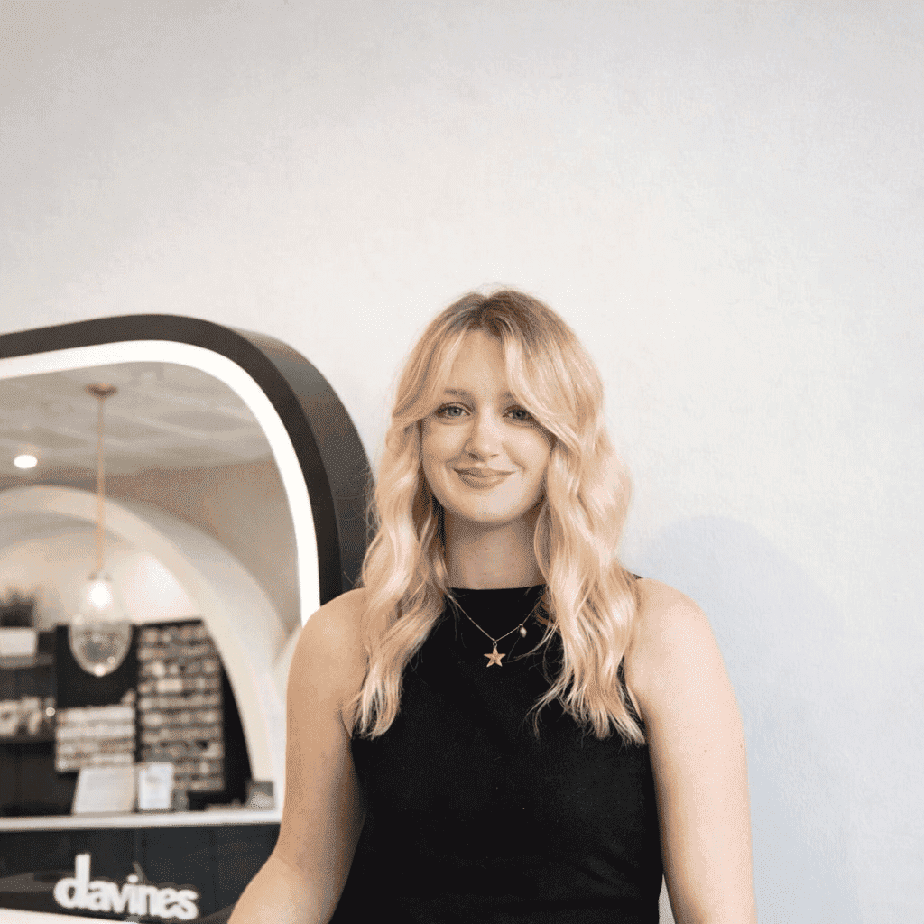 Portrait of Jillian, a professional stylist at Bonjour Belle Salon, showcasing their expertise and style.