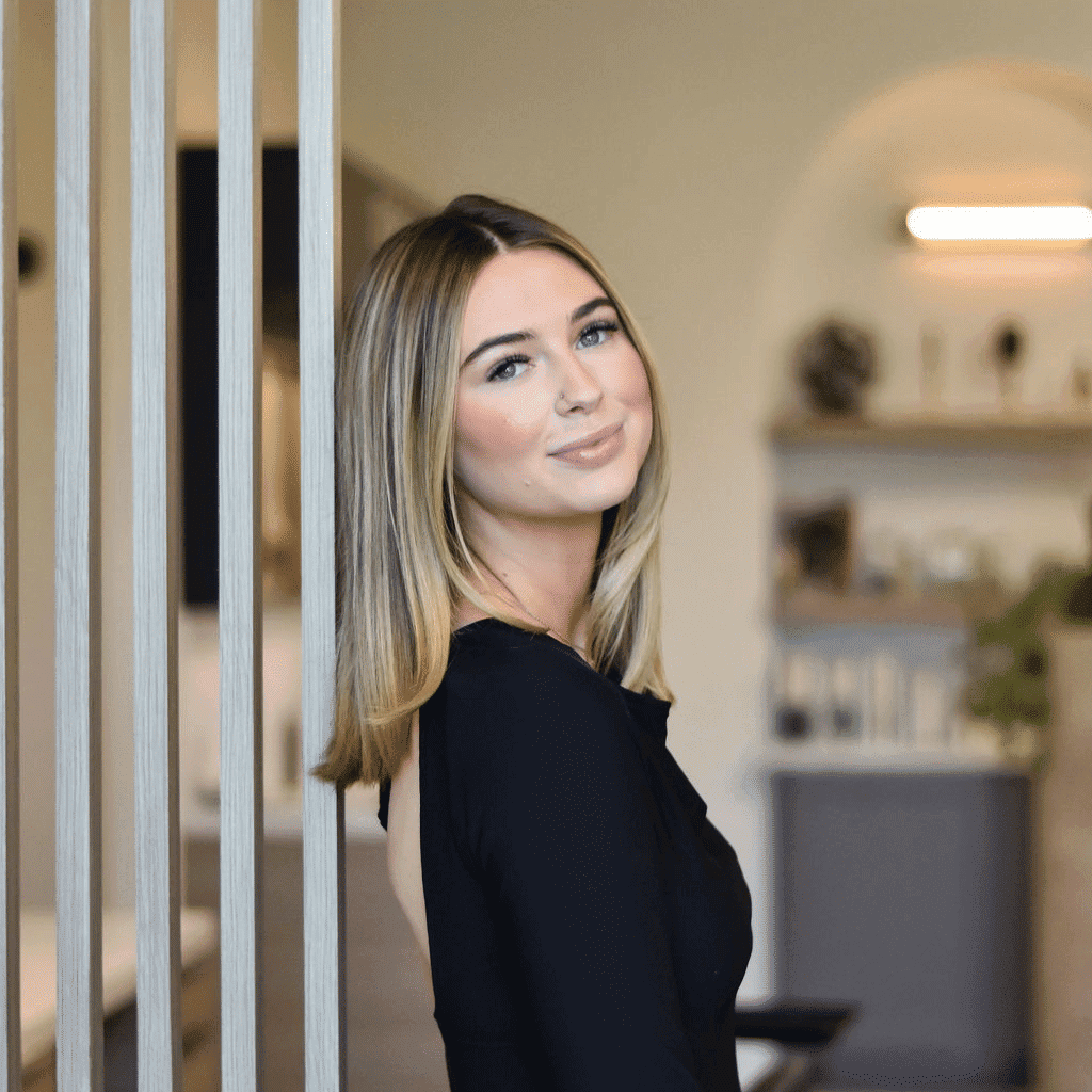 Portrait of Macie, a professional stylist at Bonjour Belle Salon, showcasing their expertise and style.