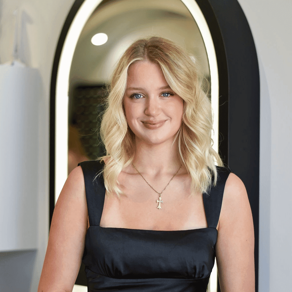 Portrait of Jillian, a professional stylist at Bonjour Belle Salon, showcasing their expertise and style.
