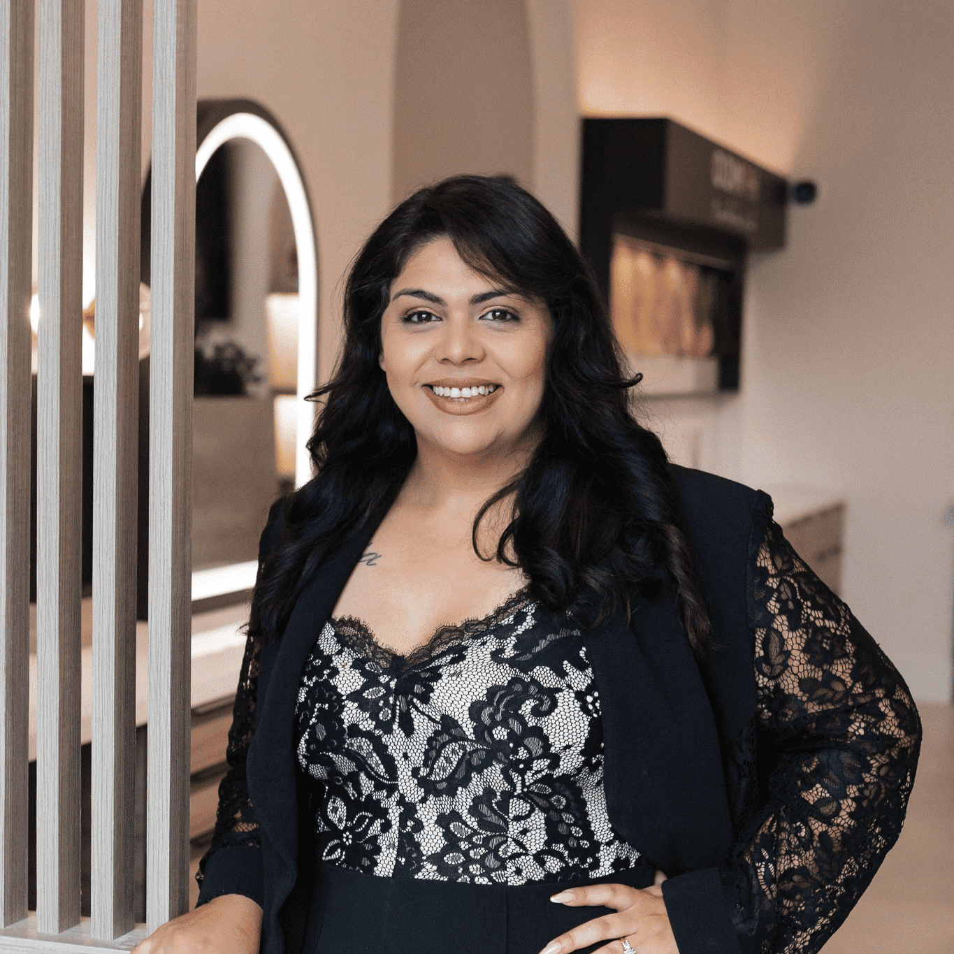 Portrait of Liz, a professional stylist at Bonjour Belle Salon, showcasing their expertise and style.